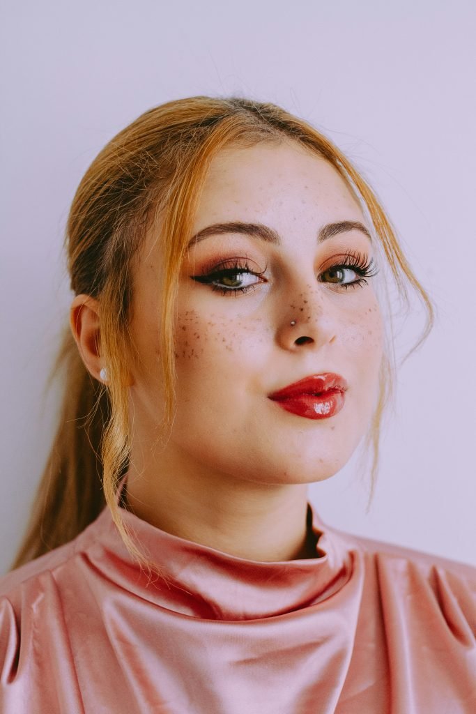 Beautiful facial portrait of a very gorgeous model .